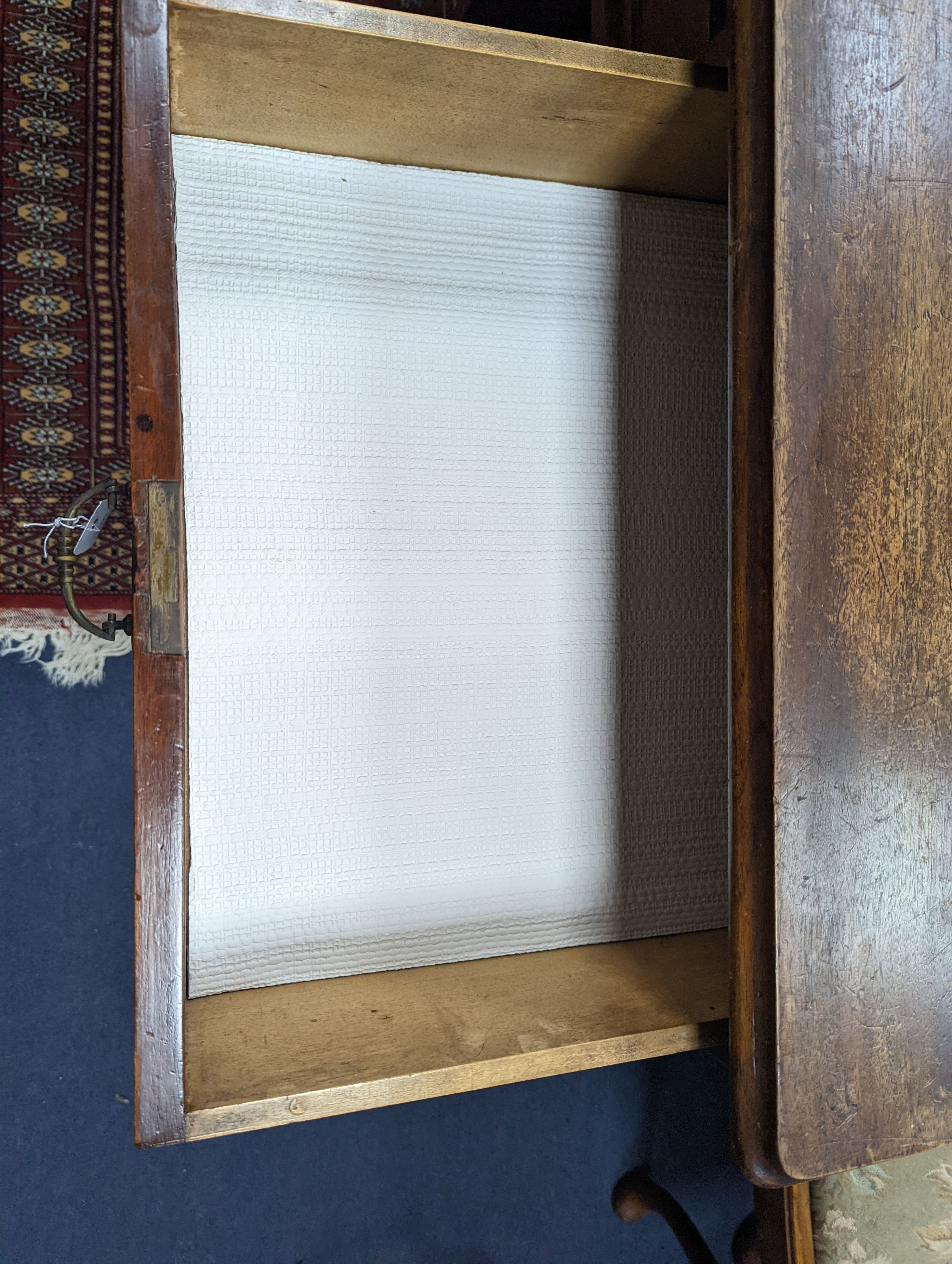 A late Victorian mahogany kneehole desk, length 107cm, height 80cm